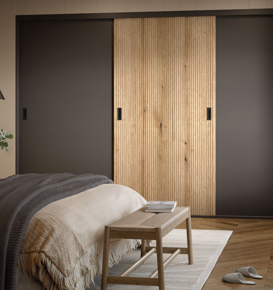 A bedroom with Reed Green Caraway Classic Square Glide Frameless doors